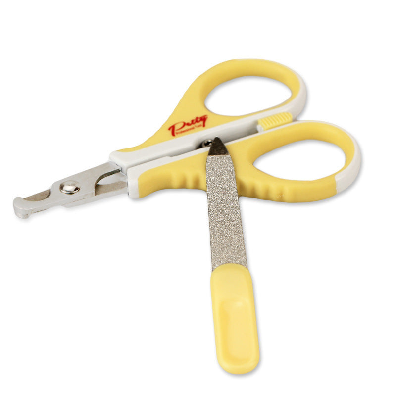 Angled view of yellow pet nail clipper with included metal file