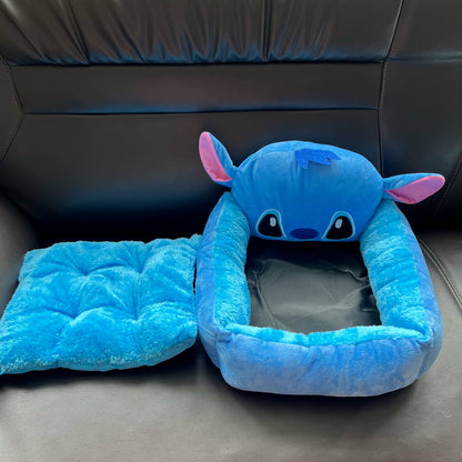Removable blue tufted cushion displayed beside the empty Stitch pet bed
