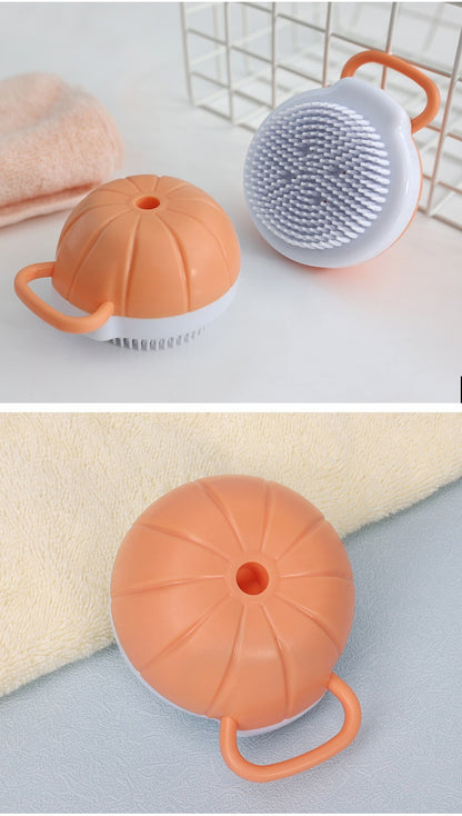 Orange and white pet bath brush showing round bristle side and top shampoo fill opening