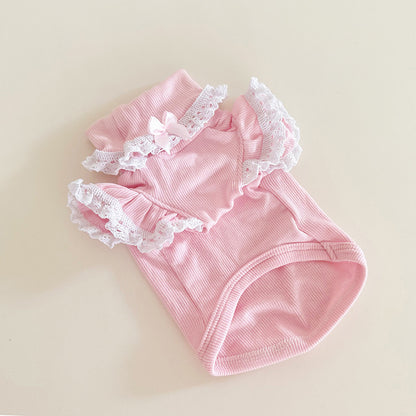 Pink 100 percent cotton ribbed pet shirt with lace ruffle trim and bow