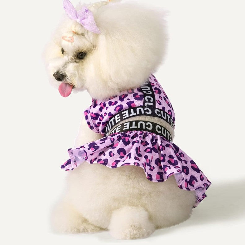 White small dog modeling the pink leopard ruffle dog dress set