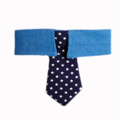 Front view of blue dog collar tie featuring navy necktie with white stars and adjustable fastening design
