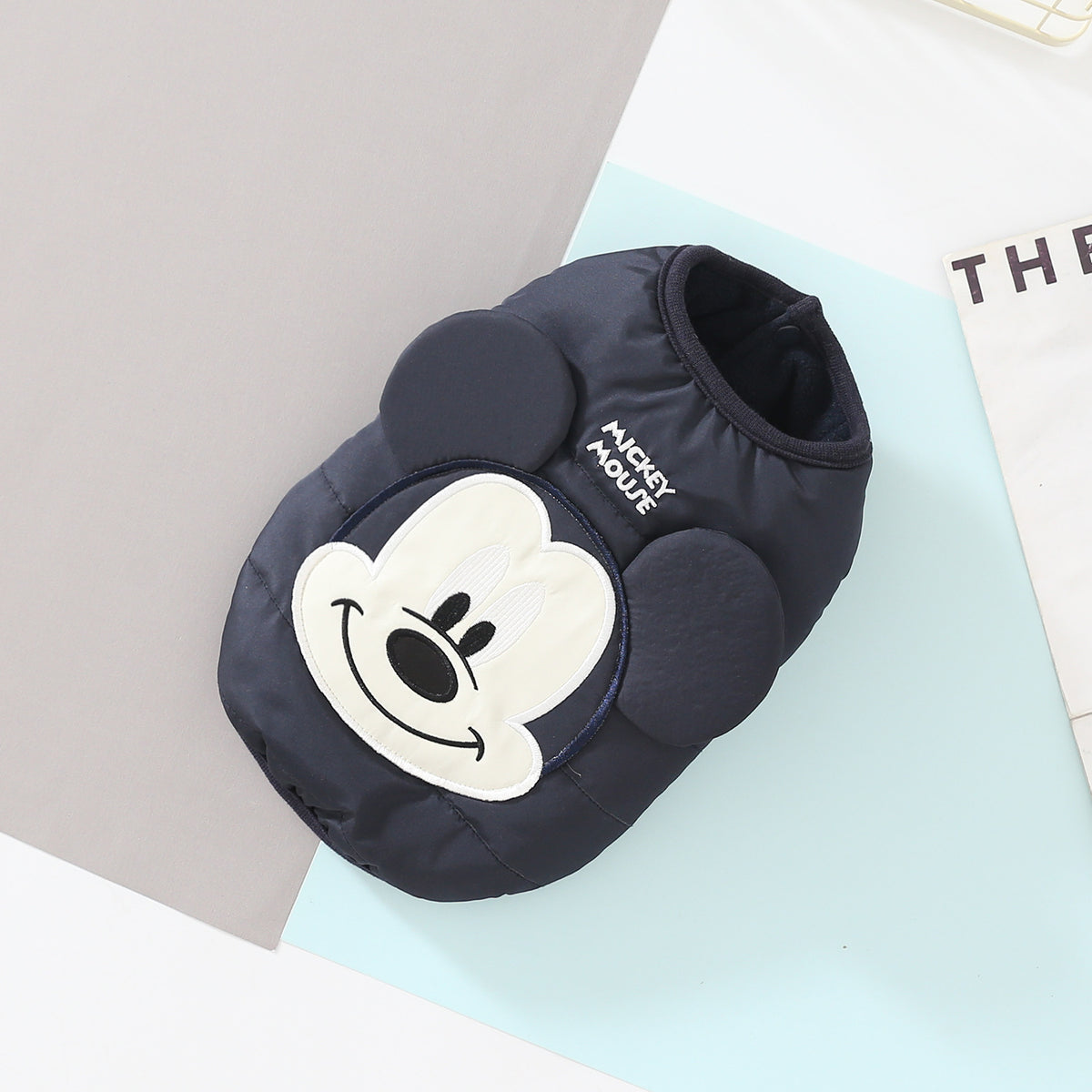 Navy blue cartoon padded dog vest with raised face and ears
