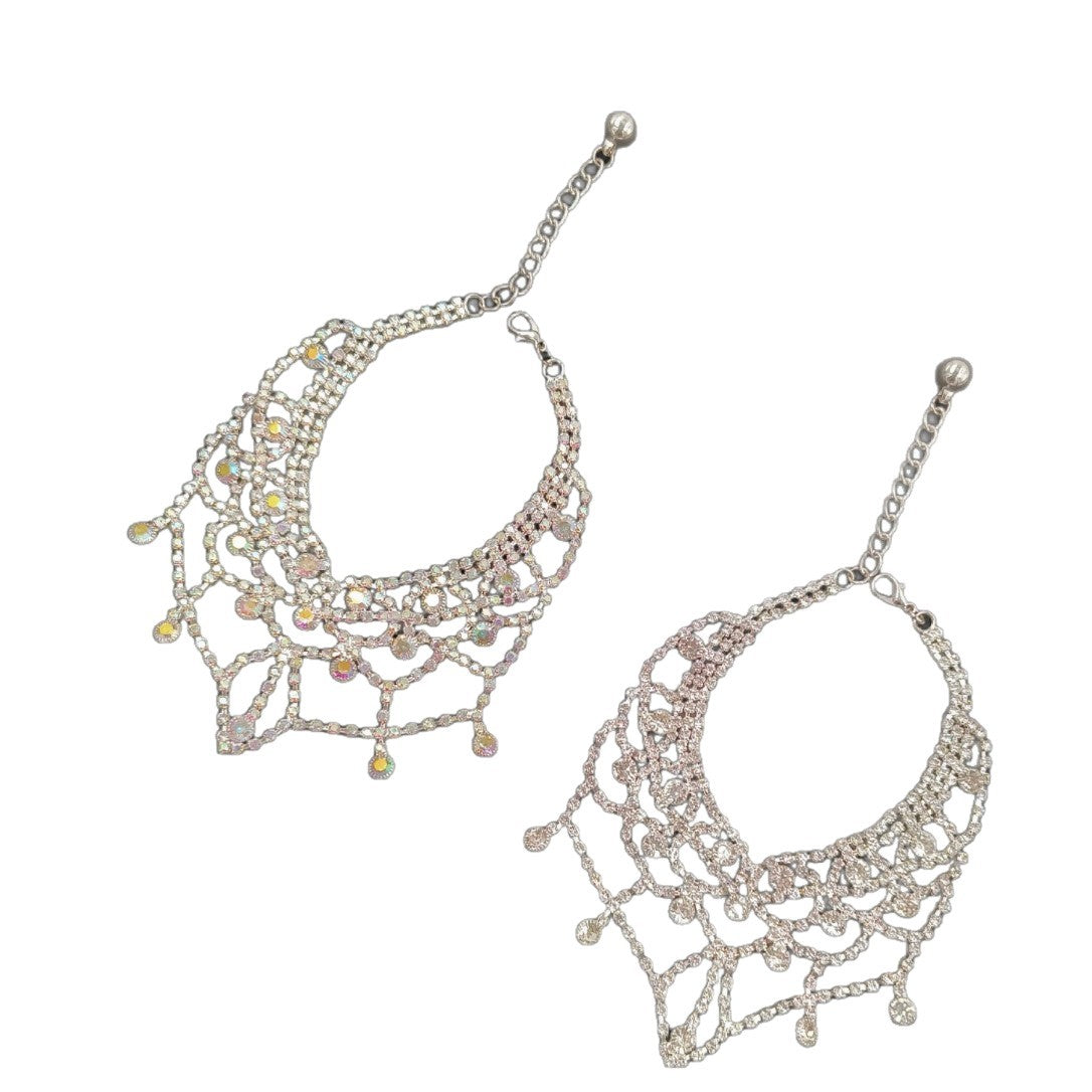 Two silver sparkle pet necklace views showing adjustable chains, scalloped design, and dangling accents