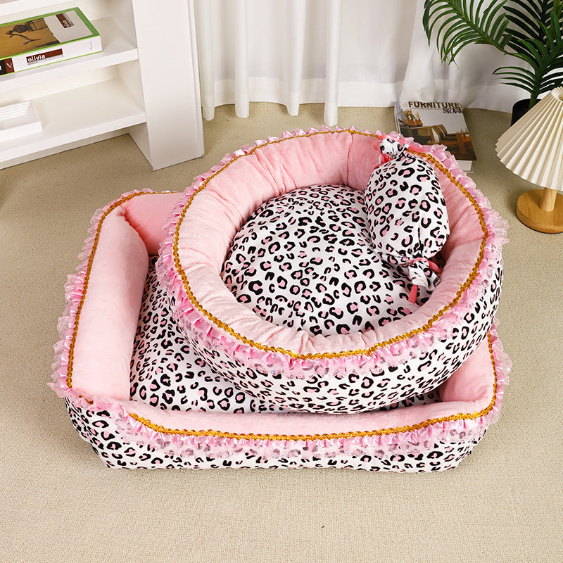 Round and rectangular pink leopard plush pet beds displayed together