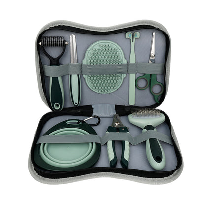 8-piece pet grooming kit organized in a gray carrying case