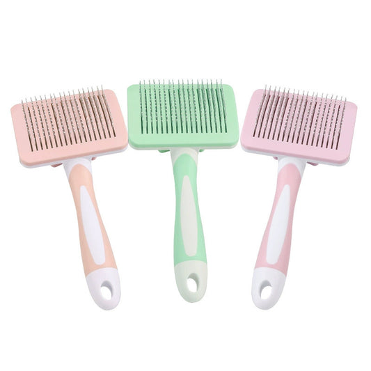 Beige Green and Pink pet slicker brushes shown together