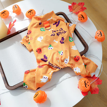 Orange pumpkin and ghost pet pajamas laid flat with four-leg one-piece design