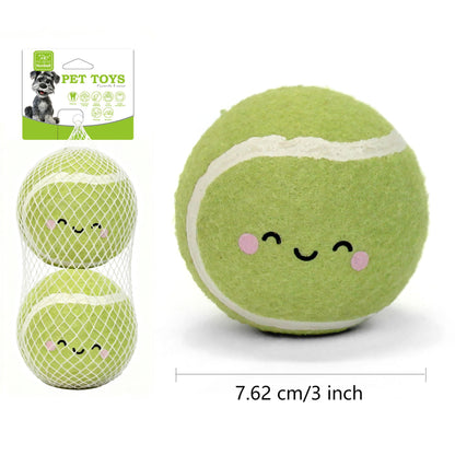 Light green smiley tennis balls two-pack, each 3 inches wide