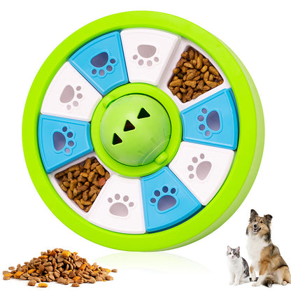 Green round dog puzzle feeder toy with blue and white sliding treat covers