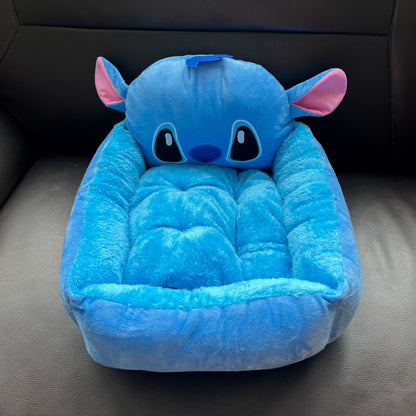 Front view of the Disney Stitch plush pet bed and tufted cushion
