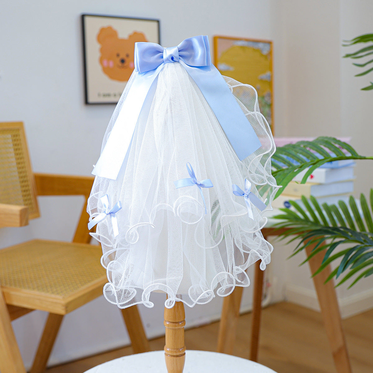 White tulle pet veil with light blue ribbon bow