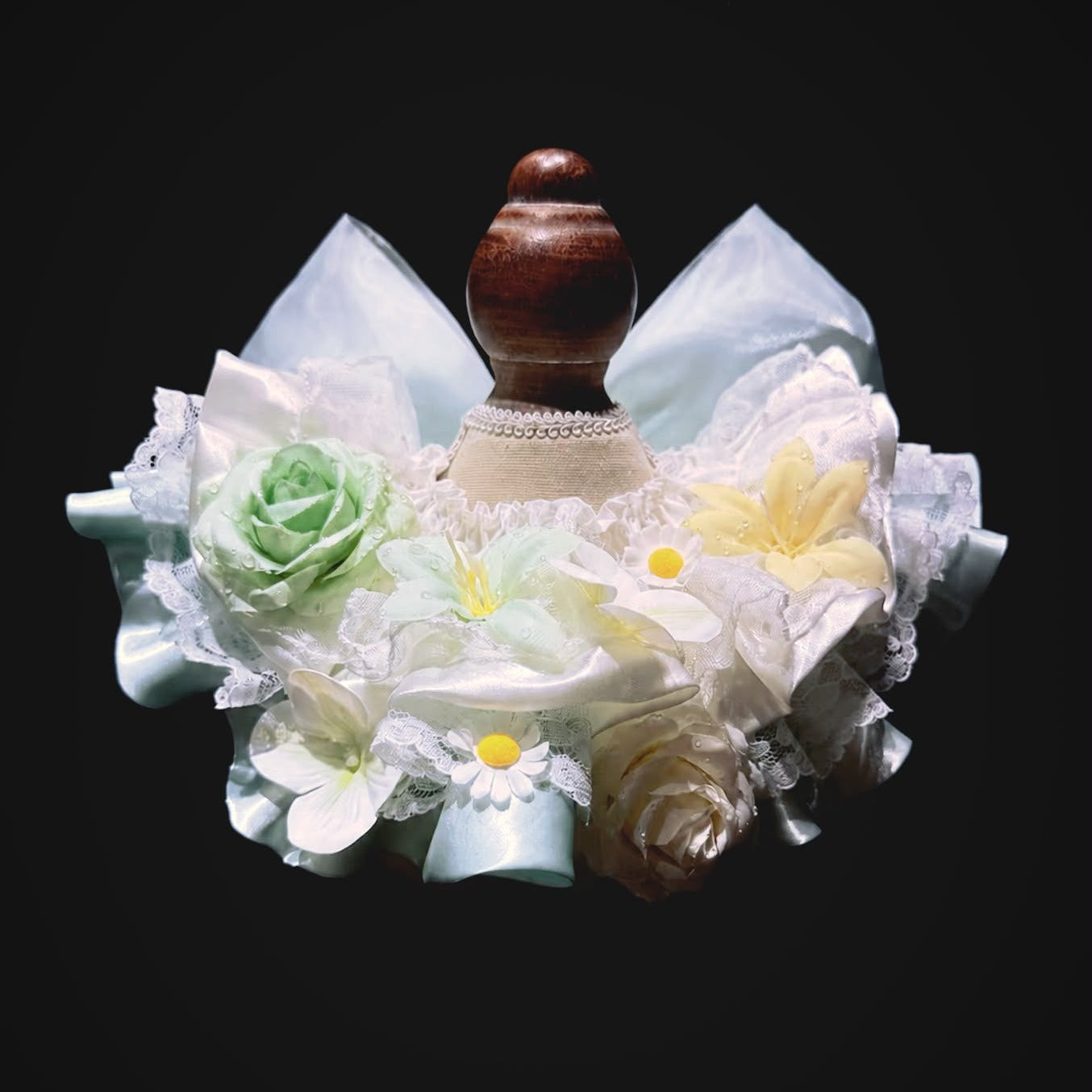 Green floral satin lace pet bib collar on a mannequin with ruffles and flower accents