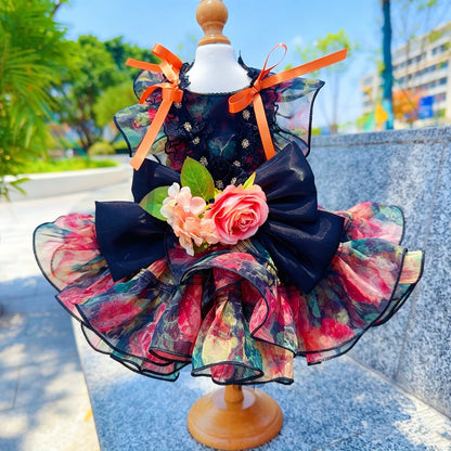 Multicolor floral tulle pet dress front view with dark bow and flower accent