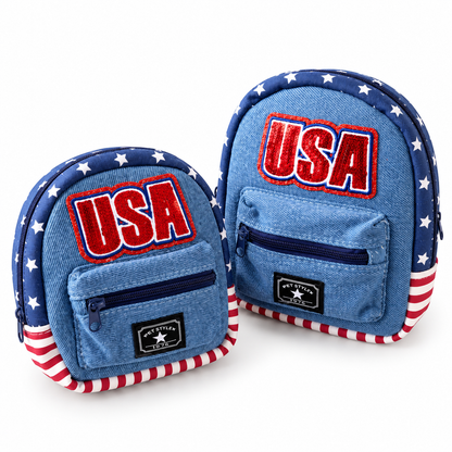 Small and medium blue denim dog backpacks with USA patch and zippered front pockets