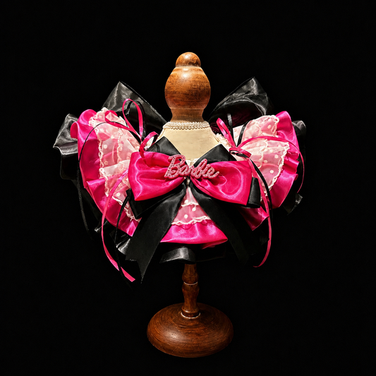Babi satin lace pet bib collar on a mannequin with hot pink and black bows