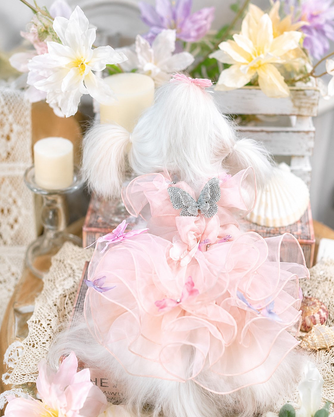 Rear view comparison of mint green and blush pink butterfly dog dresses showing breathable design and layered tulle construction