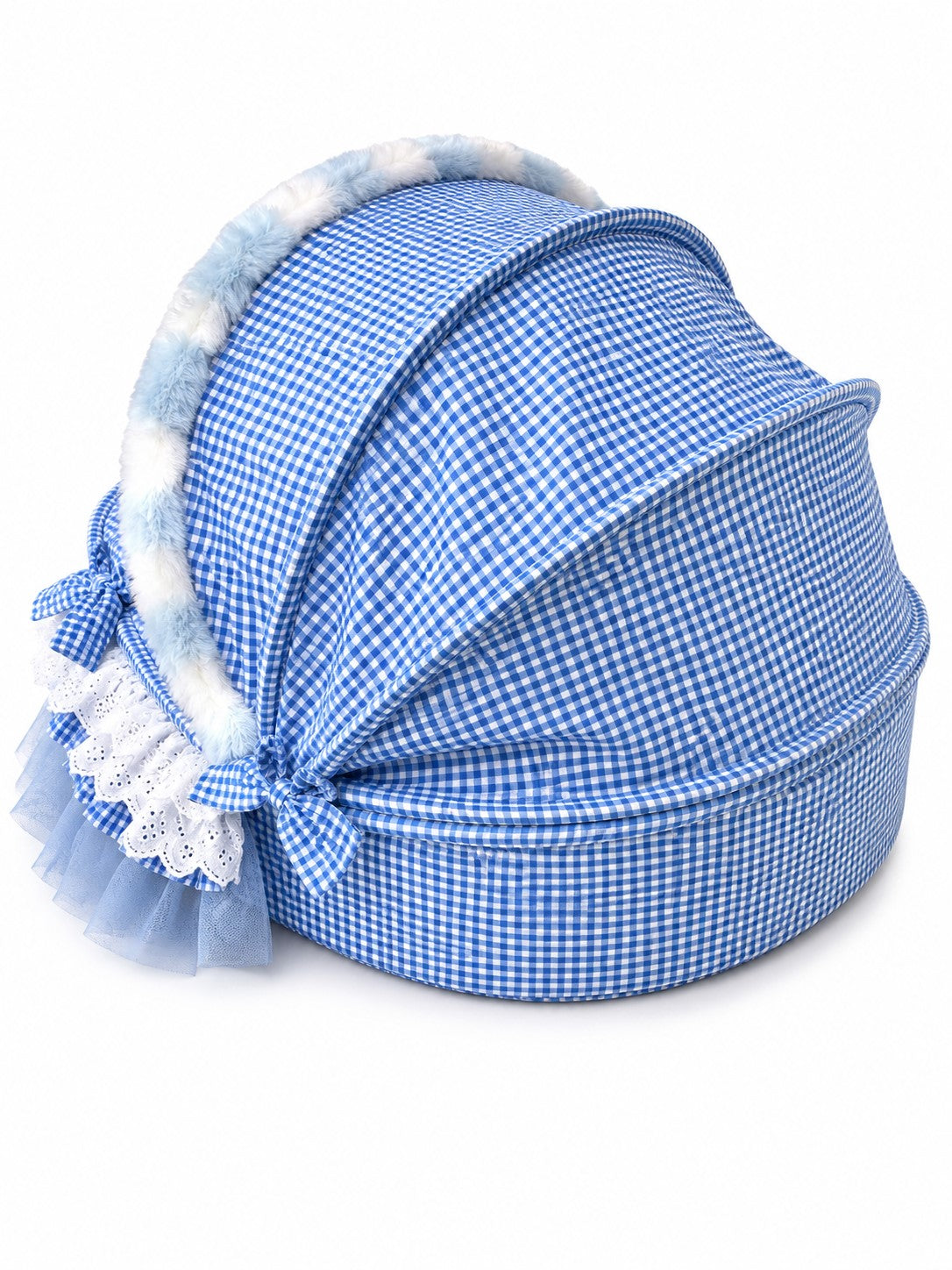 Side view of blue and white gingham covered pet bed with bow, lace trim, and rounded canopy