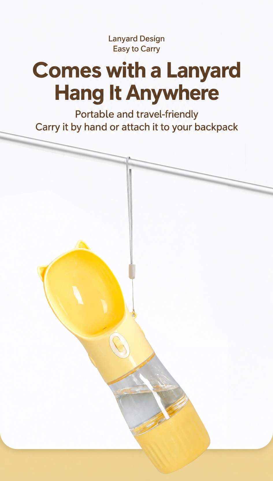 Yellow portable dog and cat water bottle hanging from its included wrist lanyard