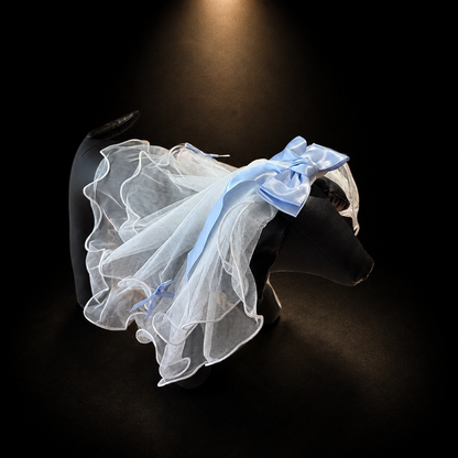 Blue tulle bow pet veil hair clip side view on black dog display form with sheer ruffles