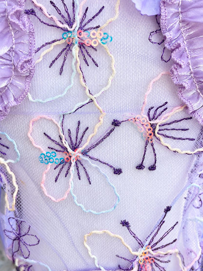 Close-up of Lavender floral embroidered mesh and sequin details