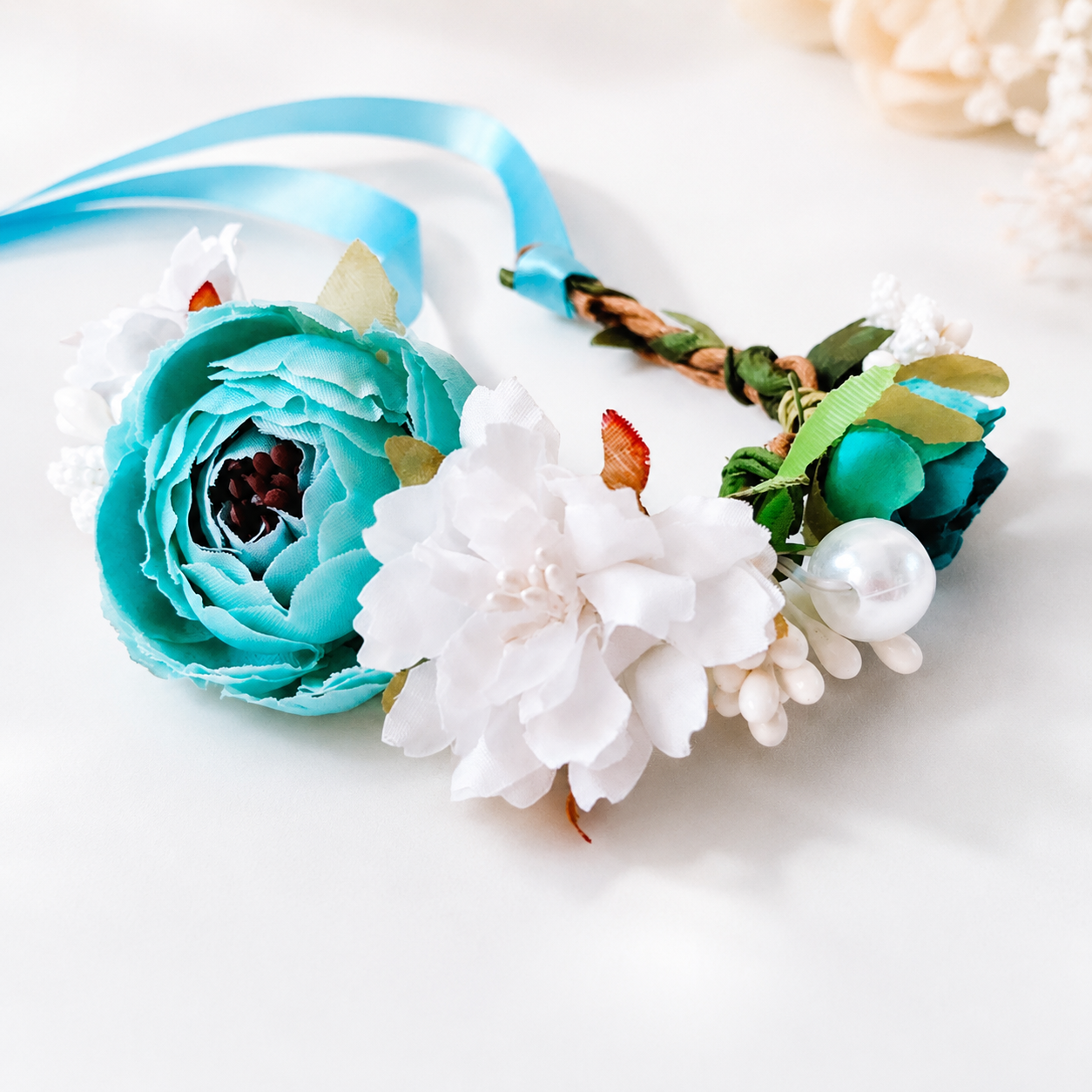 Blue and white floral pet crown headpiece with ribbon tie and pearl-style accents