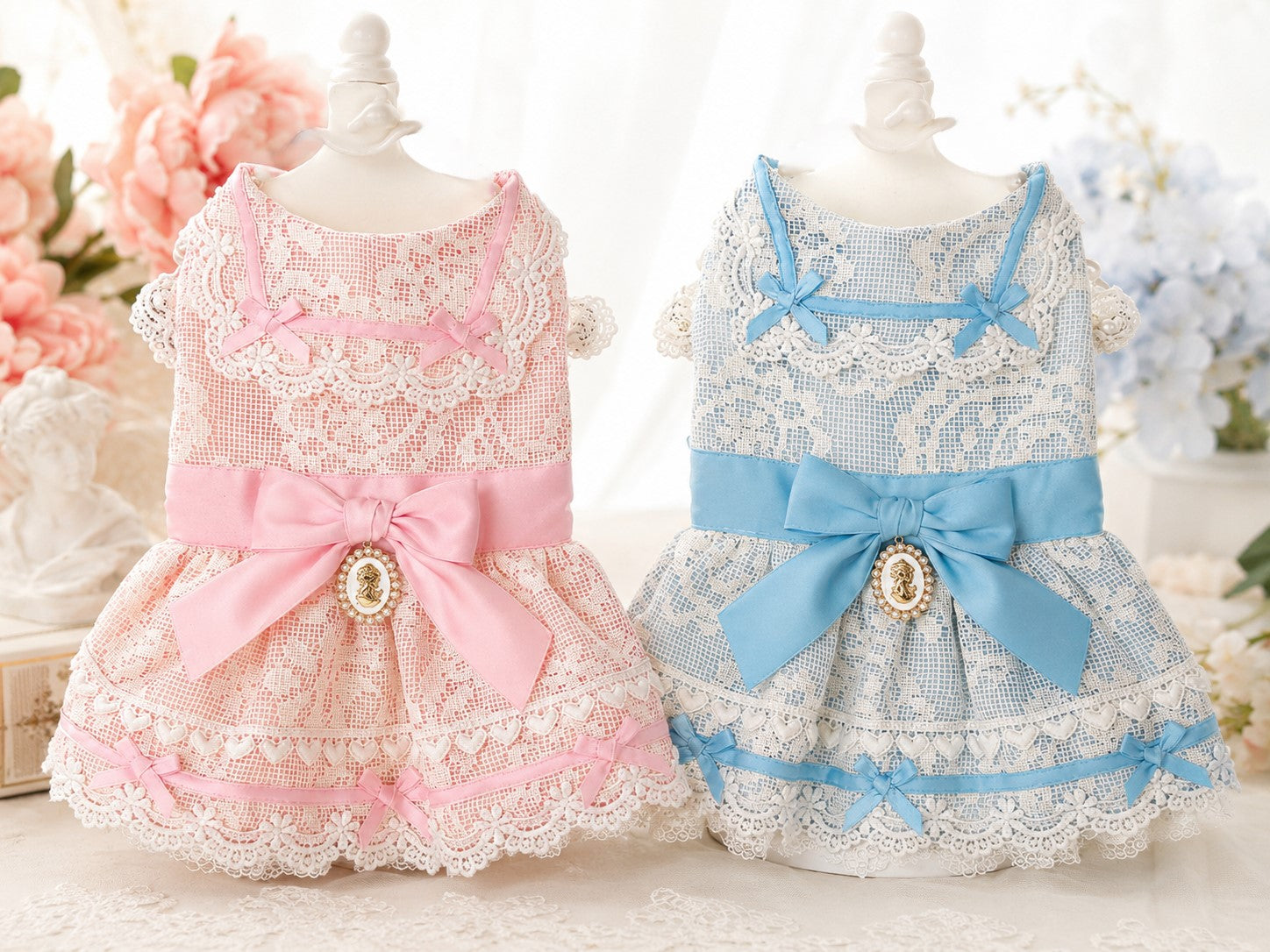 Luxury French lace princess dog dress in blush pink and sky blue with satin bow and vintage cameo brooch