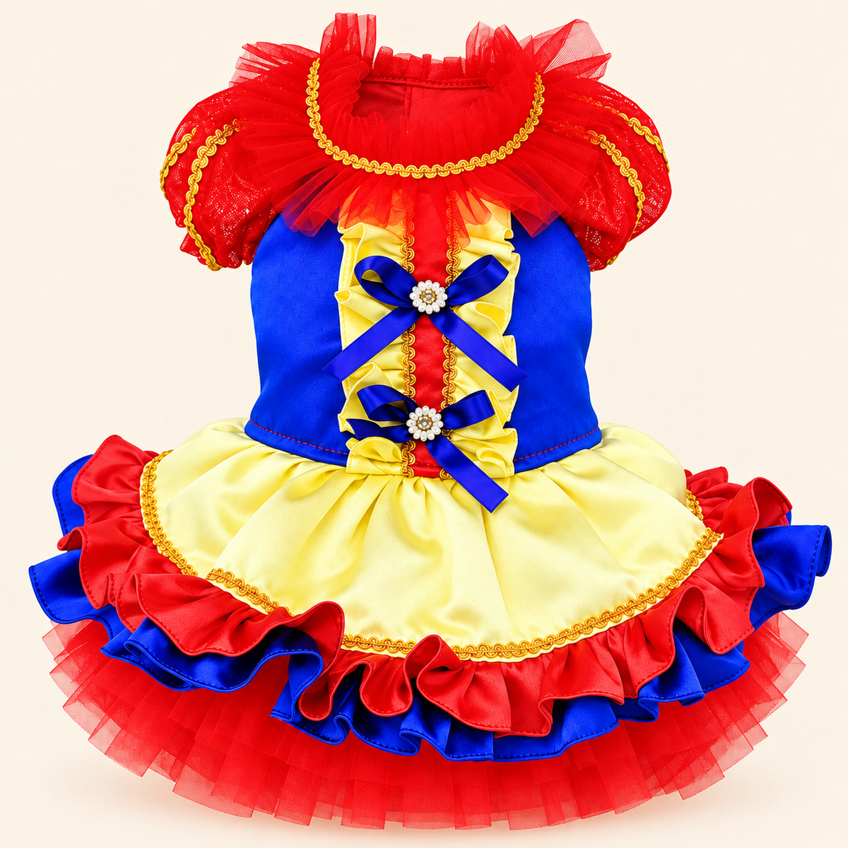 Handmade red blue and yellow Christmas pet dress on white background