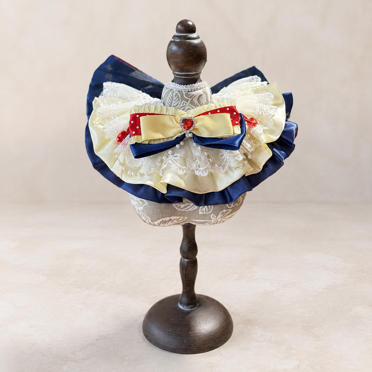 Storybook satin lace pet bib collar front view with red navy ivory ruffles and heart detail
