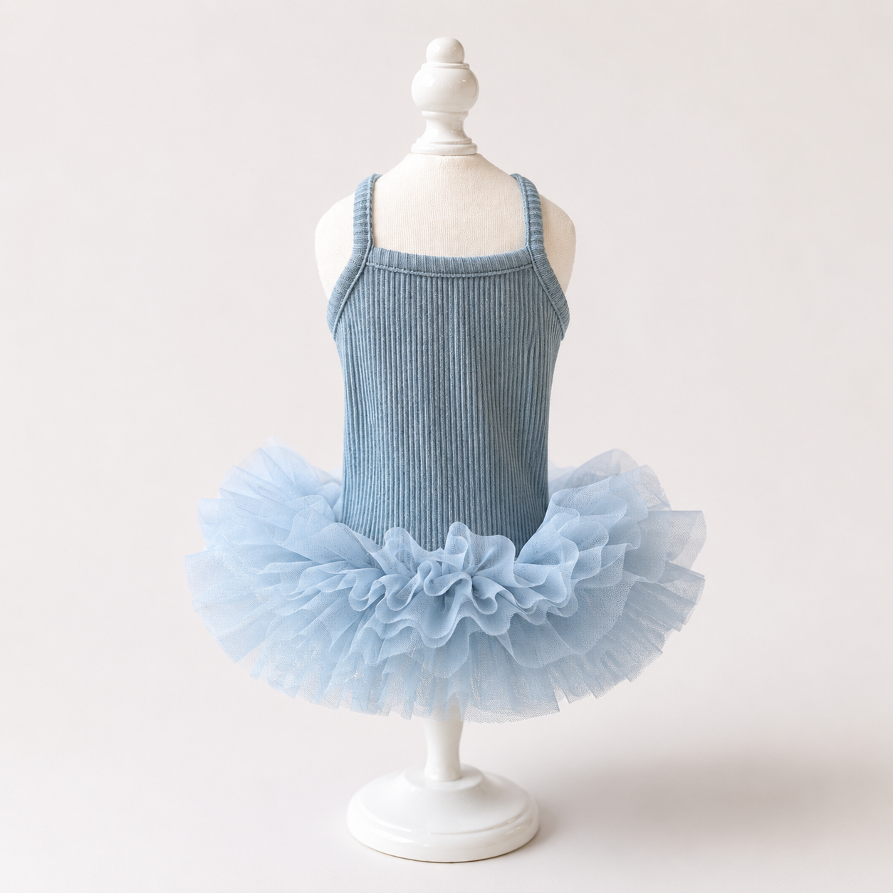 Blue ribbed knit dog tutu dress displayed on mannequin with soft fluffy tulle skirt