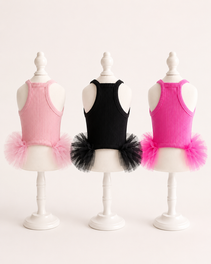 Back view of pet tutu dresses in blush pink black and hot pink showing racerback design